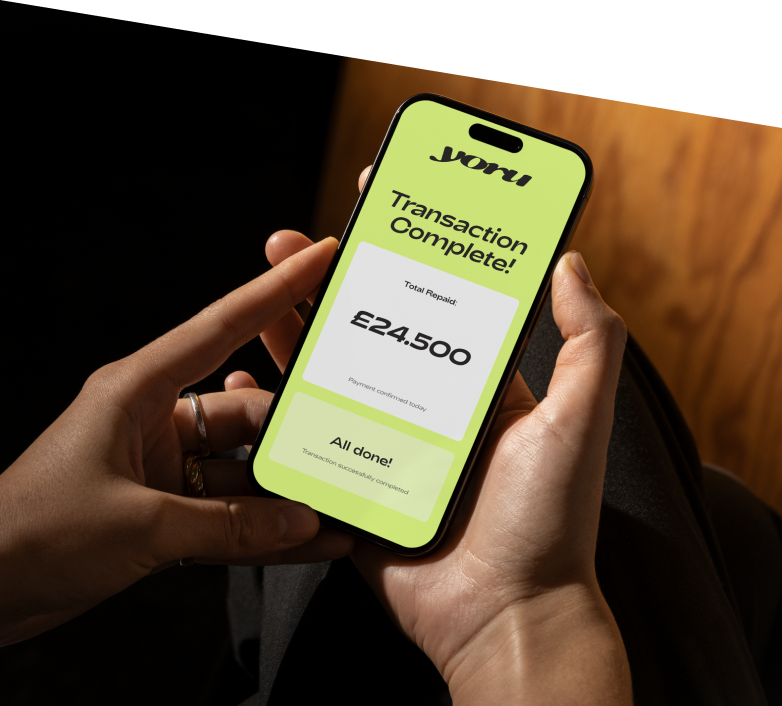 Person holding phone showing Yoru app