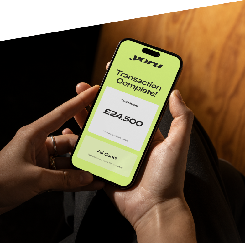 Person holding phone showing Yoru app